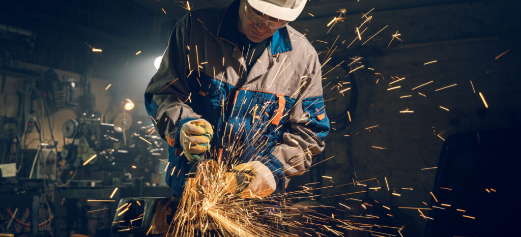 Image of locksmith working with an angle grinder